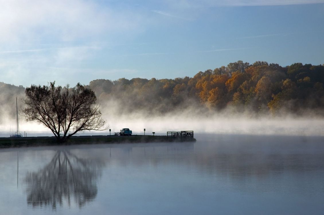 Water from a lake evaporating from the Sun’s heat