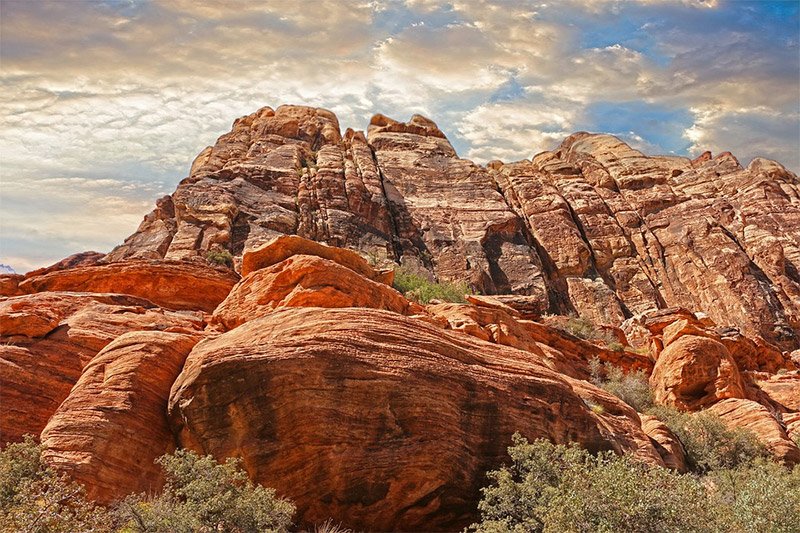 Rocks that contain iron will react with oxygen, creating a red glow. Many of them are still around from this ancient era.