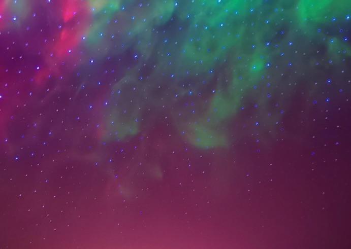 BlissLights nebula and laser star projection on a ceiling